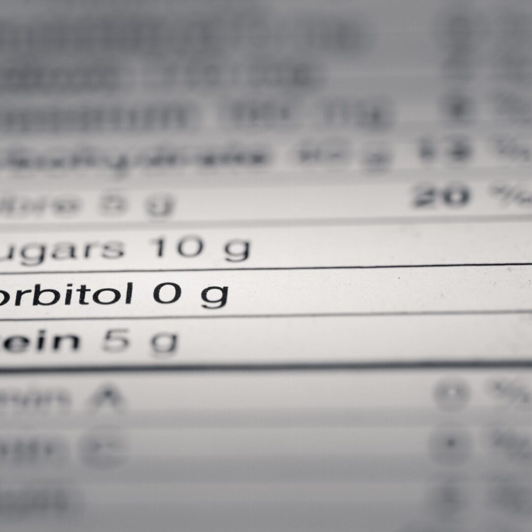 Shallow depth of Field image of Nutrition Facts Sorbitol Information we can find on a grocery Store Product.